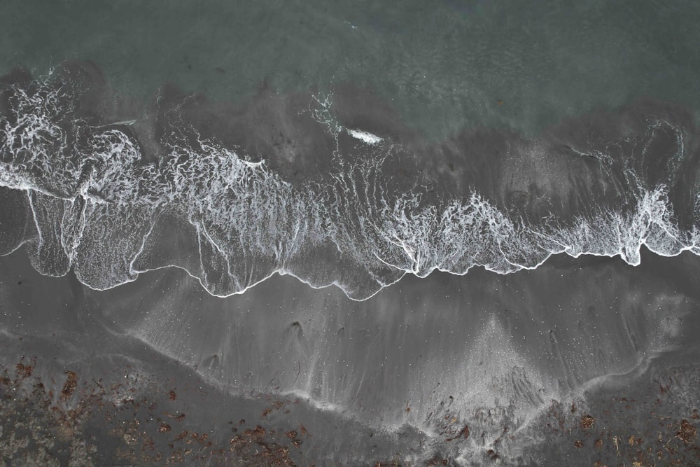 an aerial view of a beach and ocean