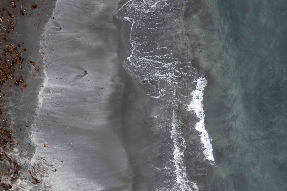 an aerial view of a beach and the ocean