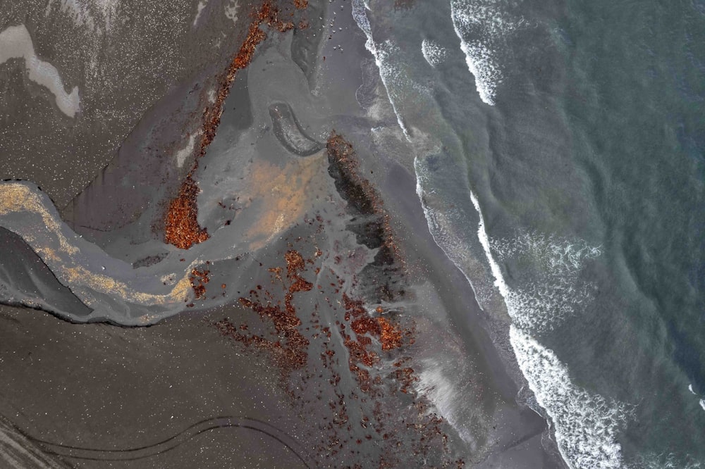 an aerial view of a beach and ocean