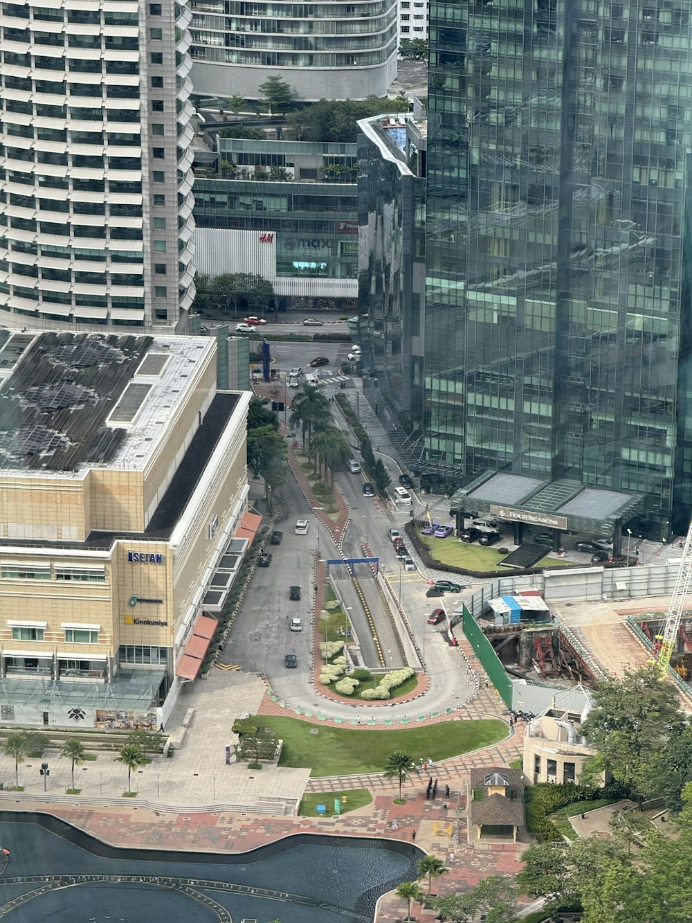 an aerial view of a city with tall buildings