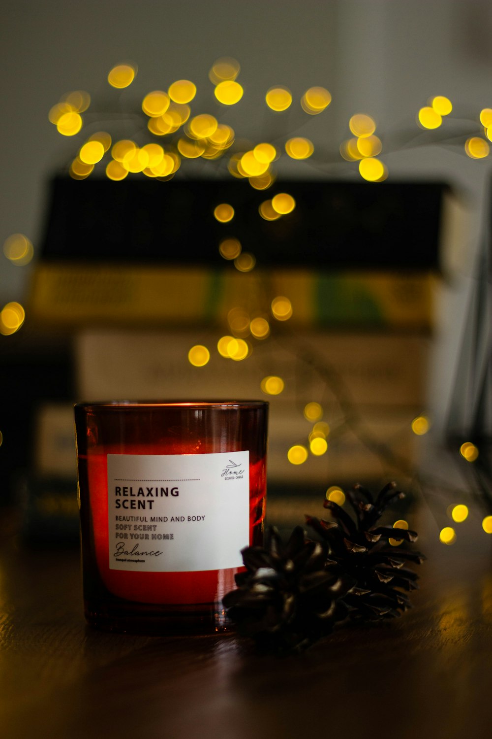 a candle sitting on top of a wooden table