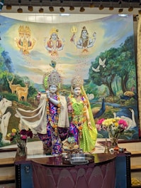 Animated depiction of the Pandavas and Krishna in a lively, colorful style.