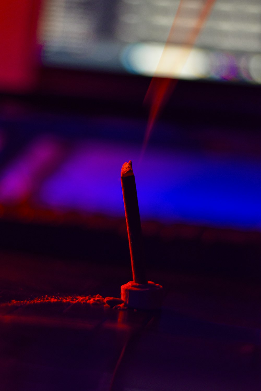 a cigarette that is sitting on a table