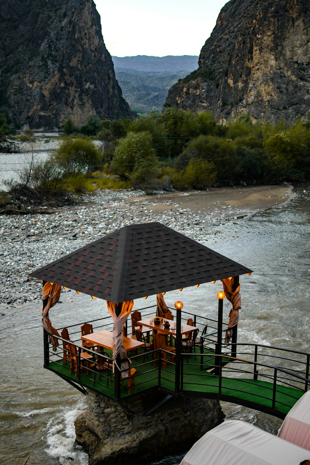 a restaurant on a bridge over a river