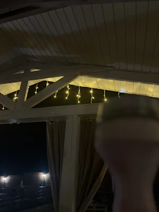 Warm ambient lighting casting a soft glow over a stylish event setup.