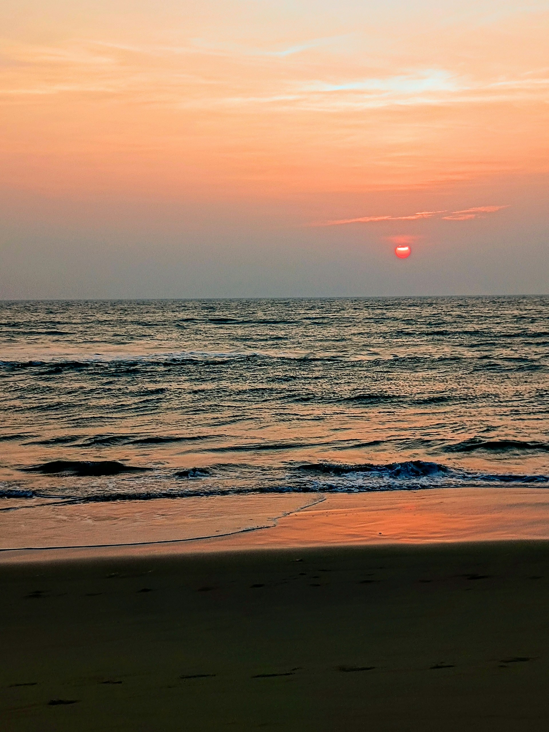 woman wearing yellow long-sleeved dress under white clouds and blue sky during daytime