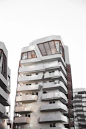 Modern apartment building blending with historic architecture in Querétaro.
