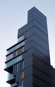 Architectural render of a modern high-rise inspired by iconic global towers.