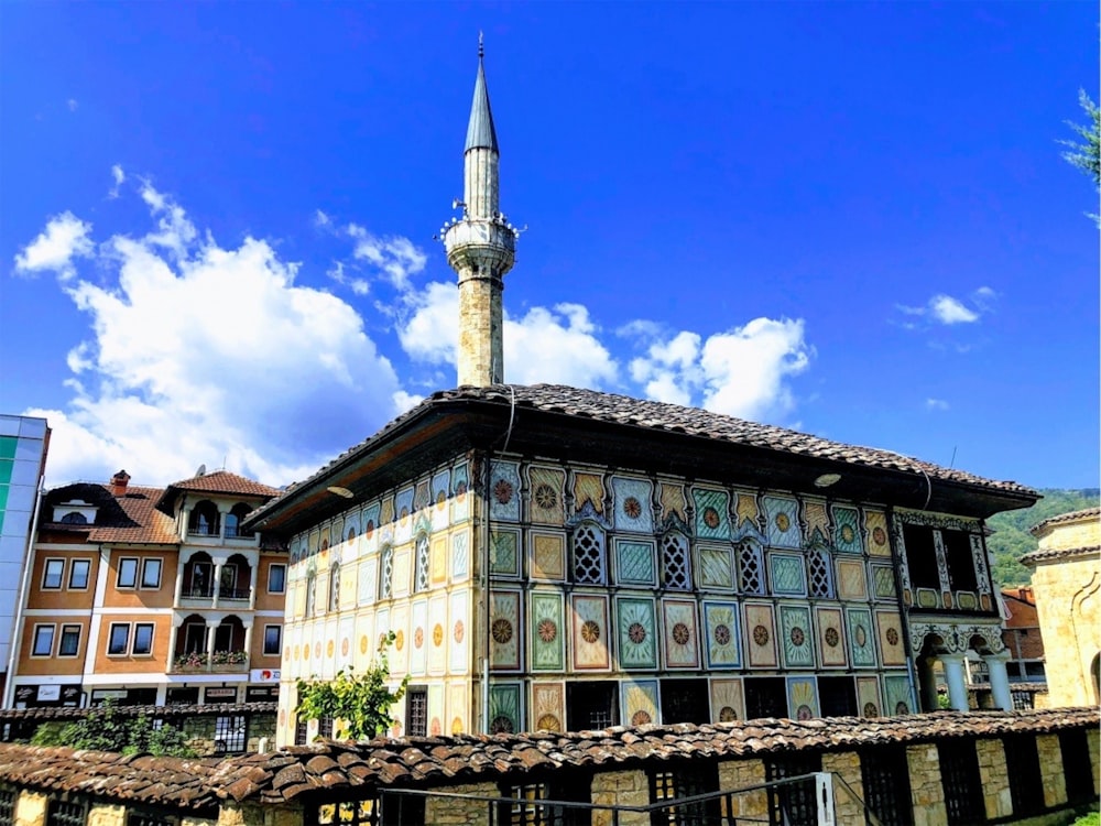 a tall building with a clock tower on top of it