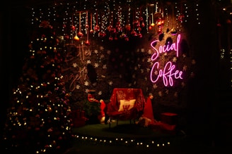 A cozy Christmas-themed photo shoot setup with festive decorations.