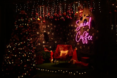 Cozy event corner decorated with personalized backdrops and neon signs