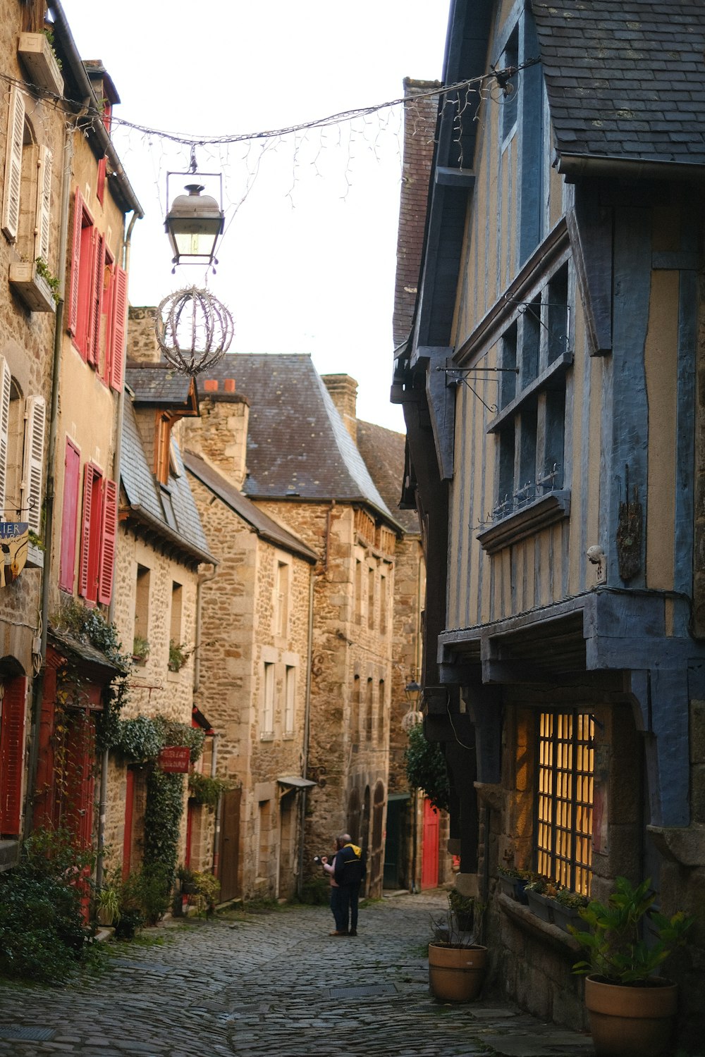a cobblestone street in an old european city