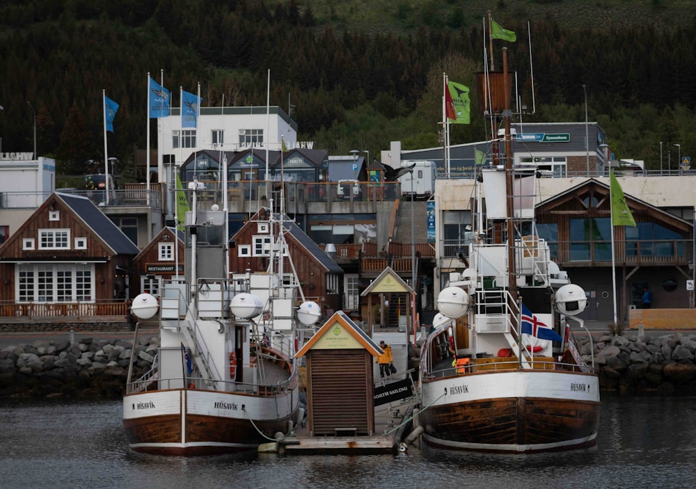 a couple of boats that are sitting in the water