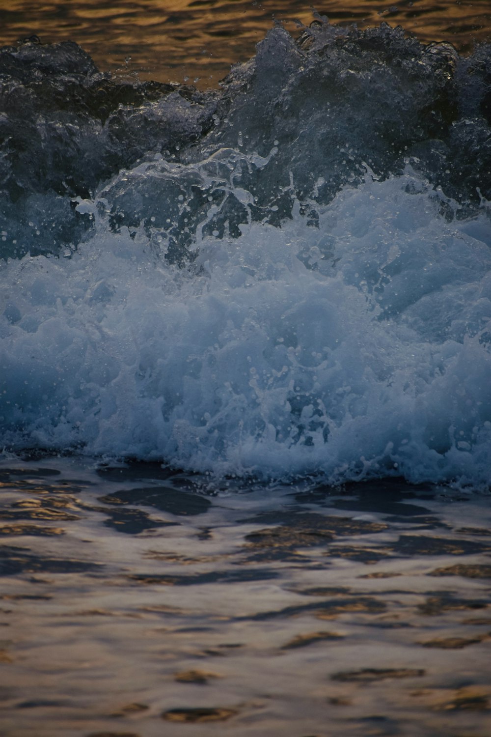 a close up of a wave on the water