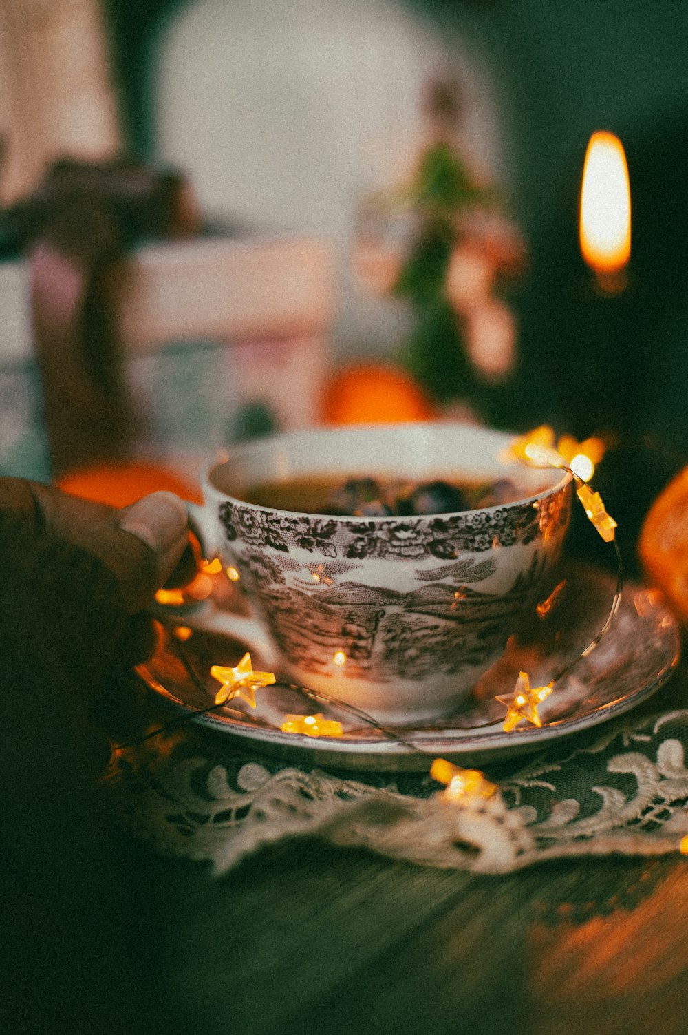 a cup of tea on a saucer on a table