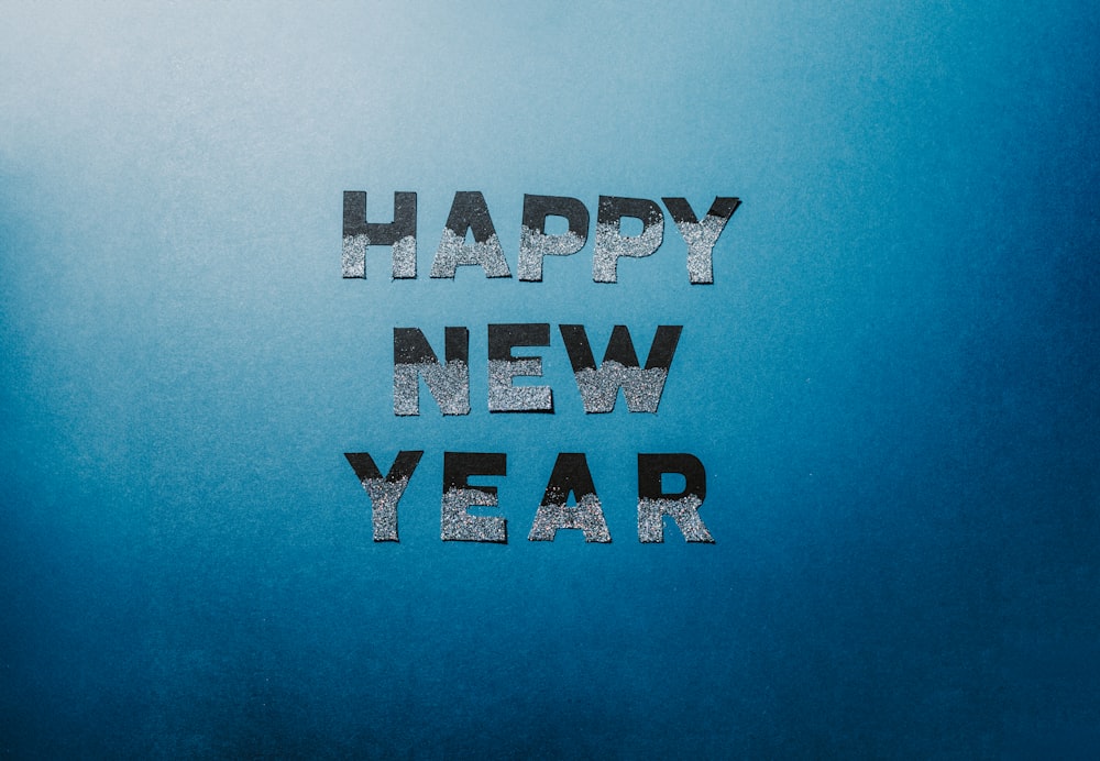 a blue background with the words happy new year