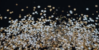 A close-up of sparkling confetti ready for a celebration.