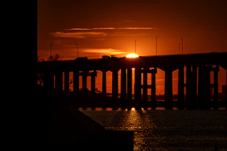 Vibrant photo of the Bridge of the Americas spanning the Panama Canal at sunset