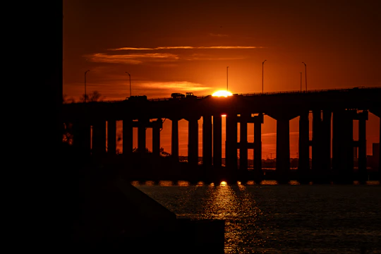 Vibrant photo of the Bridge of the Americas spanning the Panama Canal at sunset