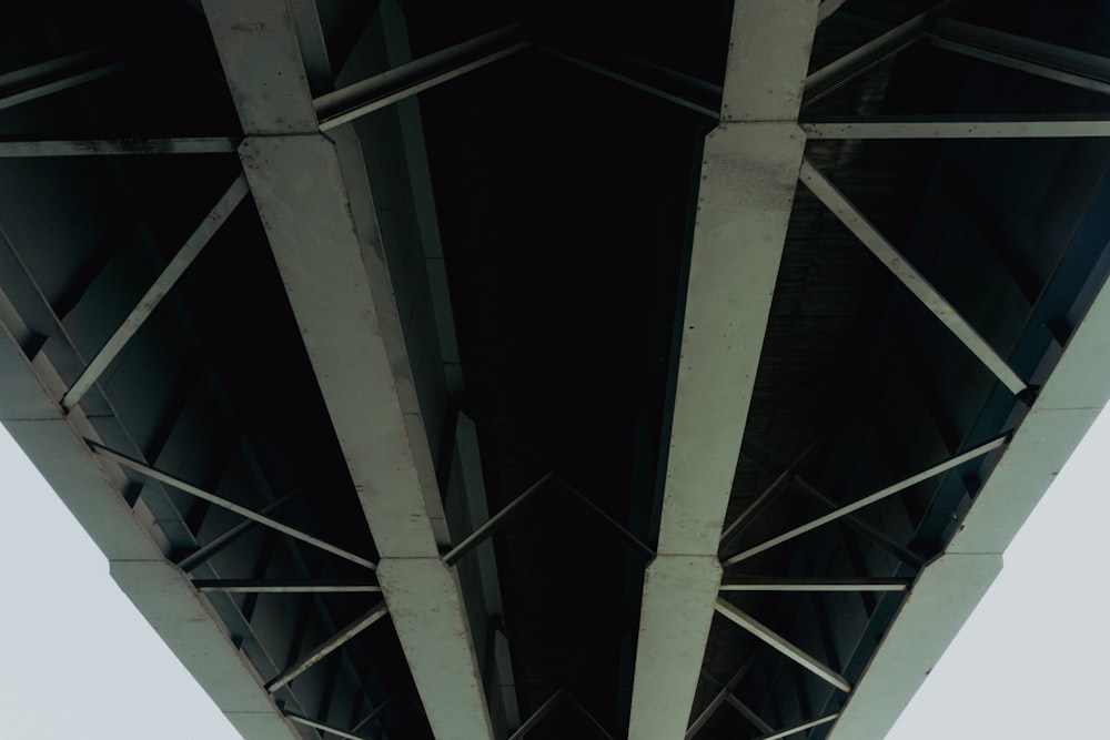 a view of the underside of a bridge from below