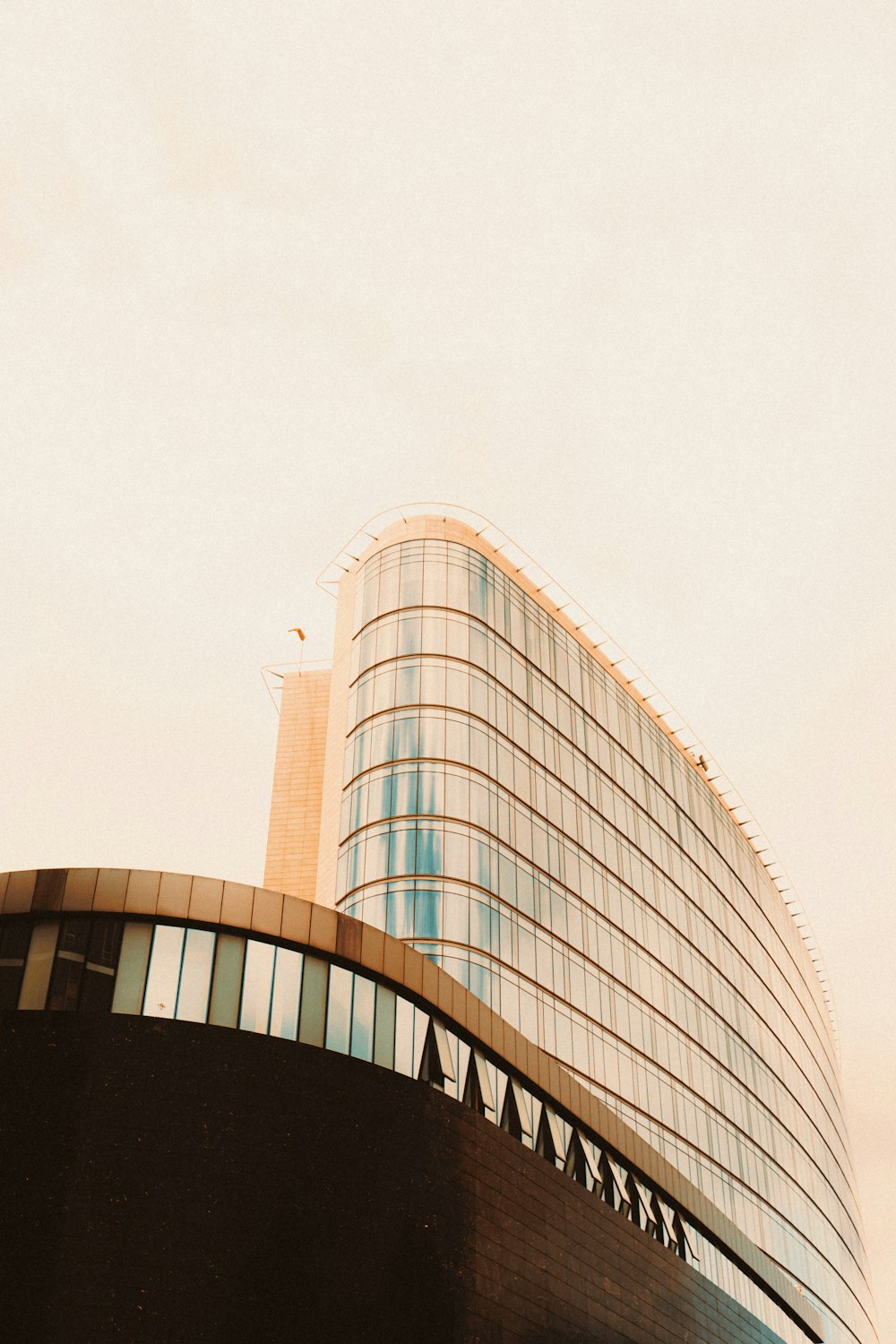 a tall building with a clock on the side of it