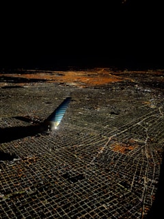 An aerial view of a city with digital connectivity graphics overlay.