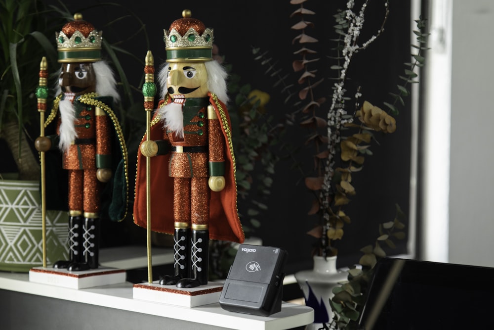 a couple of nutcrackers sitting on top of a table