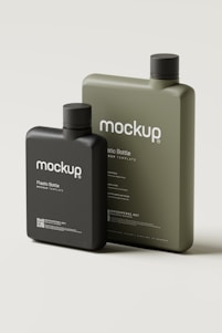 a couple of bottles of liquid sitting next to each other