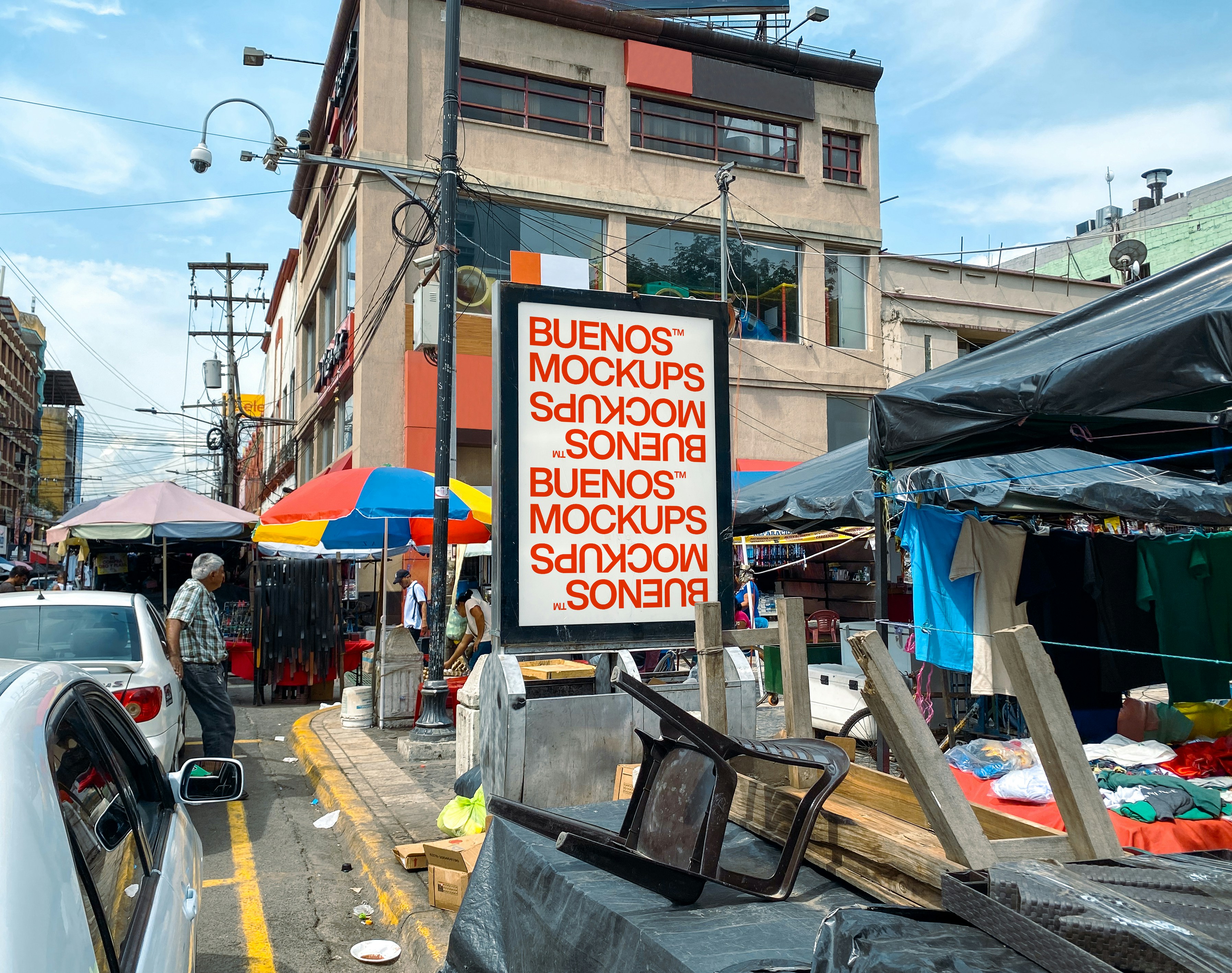 a city street with a sign that reads buenos mockucks, so