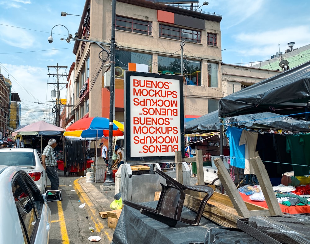 a city street with a sign that reads buenos mockucks, so