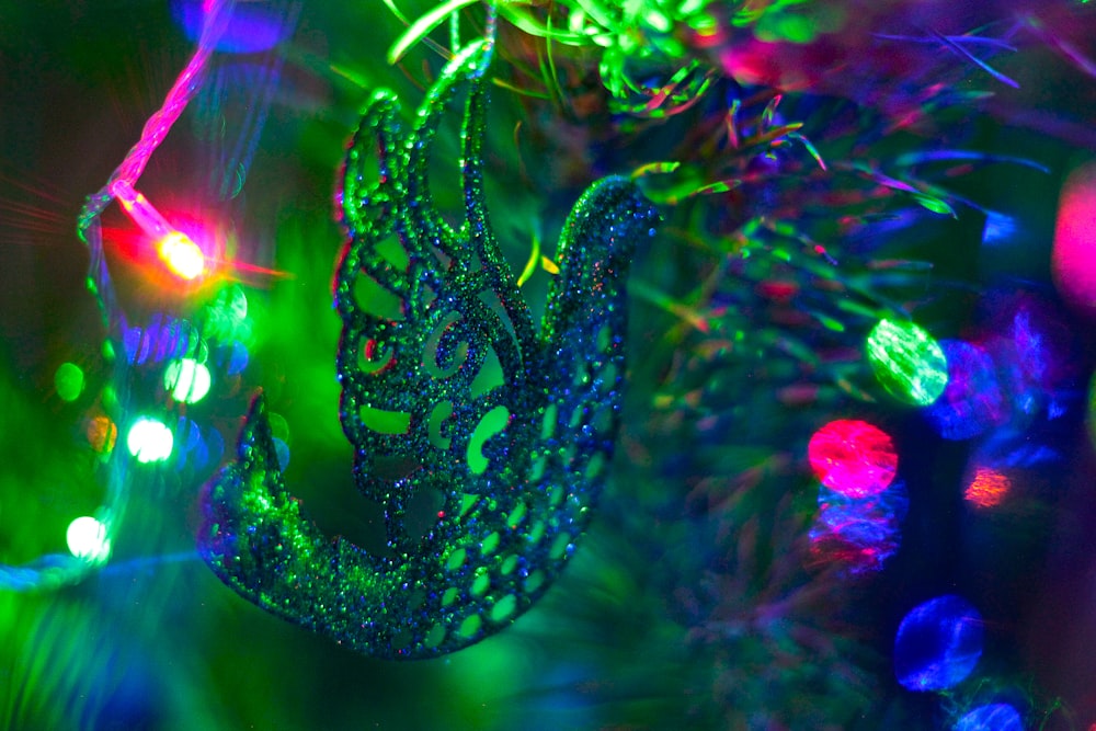 a close up of a christmas ornament on a tree