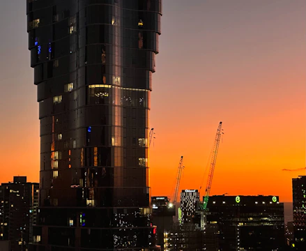 A modern city skyline at dusk highlighting commercial real estate investments.