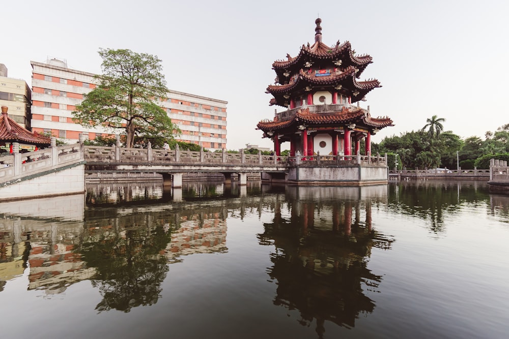 a building sitting on top of a body of water