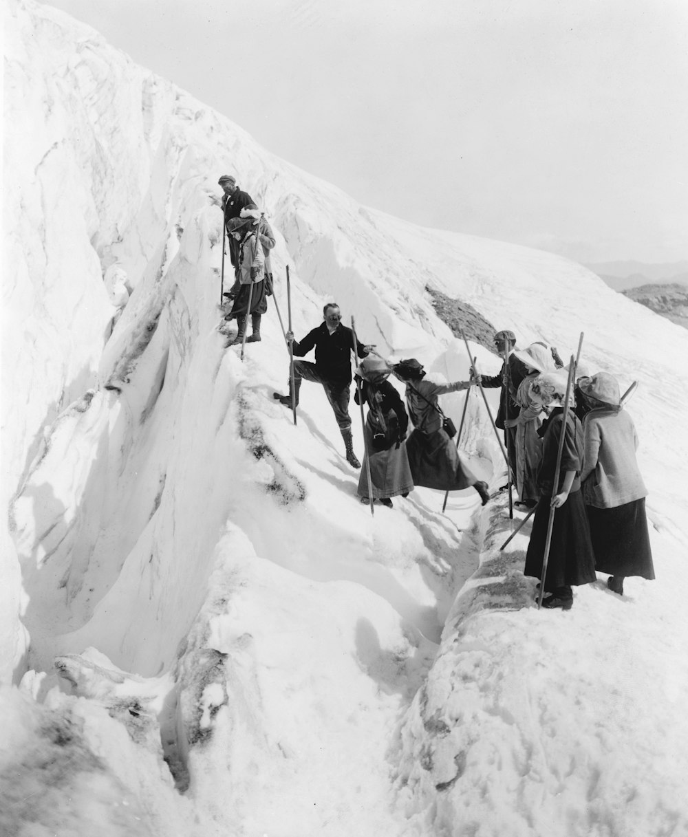 Group of men and women climbing Paradise Glacier in Mt. Rainier National Park, Washington