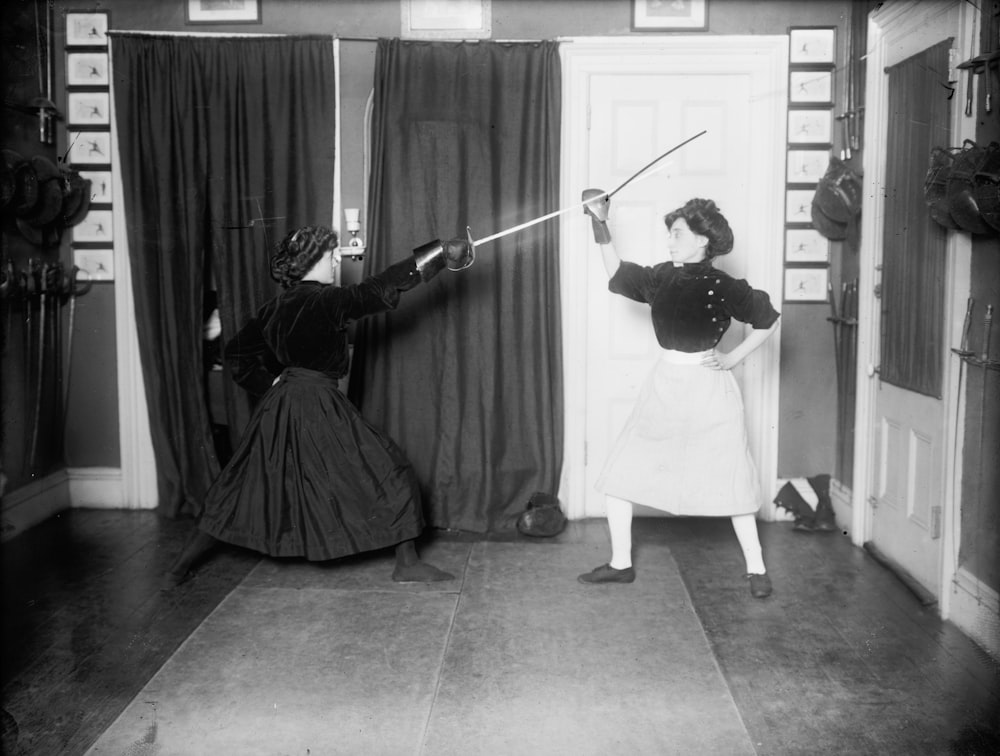 two women fencing at Professor O. Malvido's school