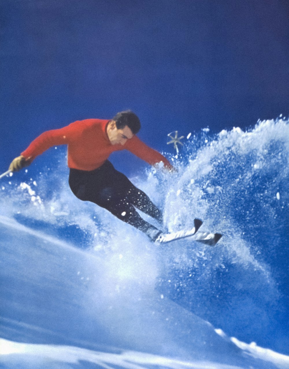 Advertisement showing man skiing