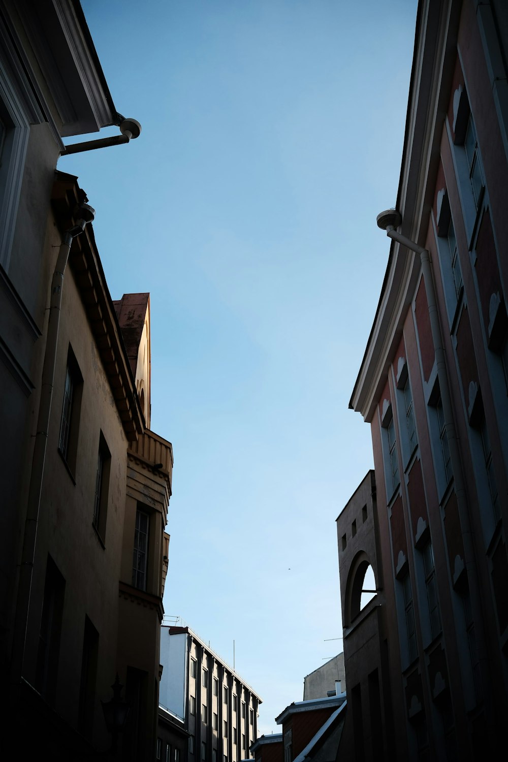 a view of a street with buildings and a sky background