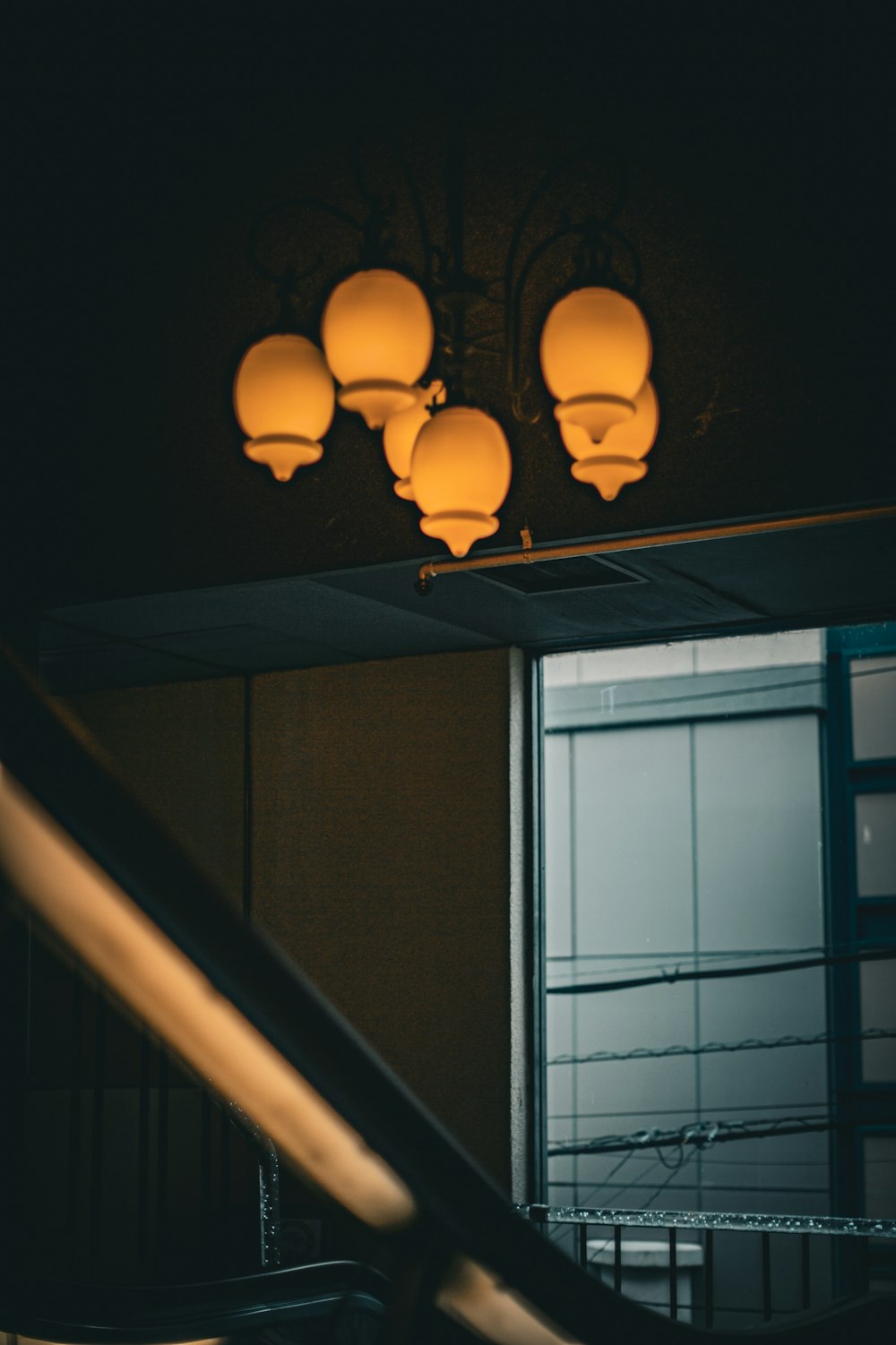 a bunch of lights that are on a ceiling