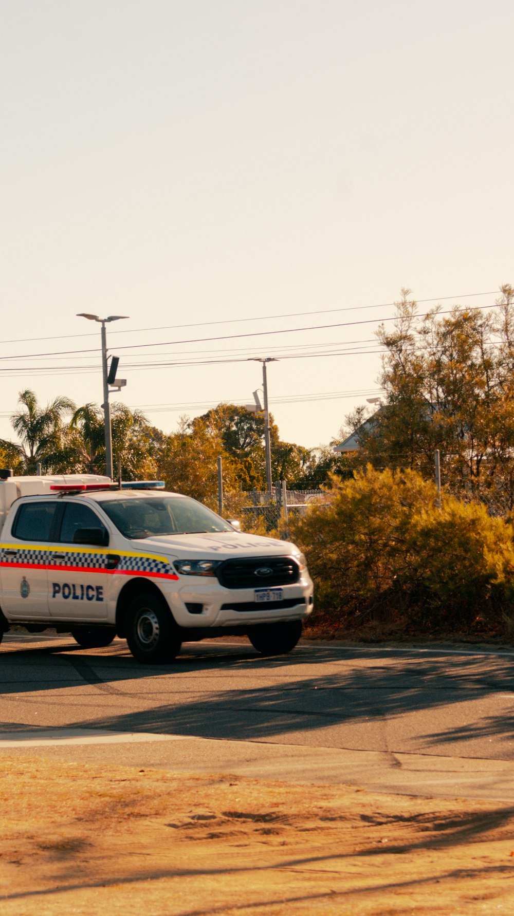 a police car parked on the side of the road