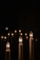 Softly lit candles arranged to create a warm, inviting atmosphere.
