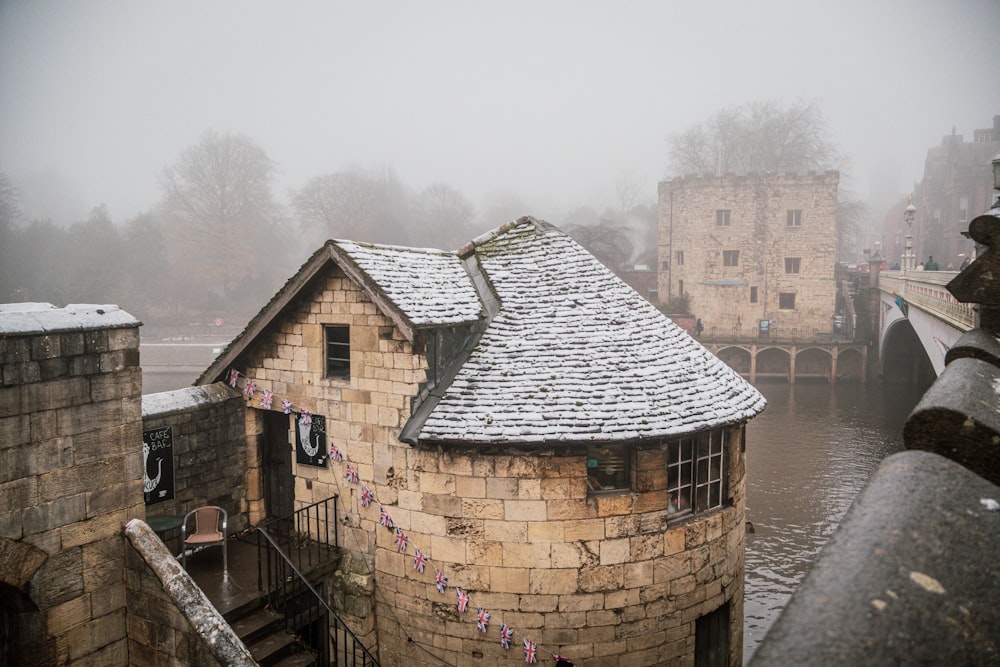 a stone building with a clock tower on top of it