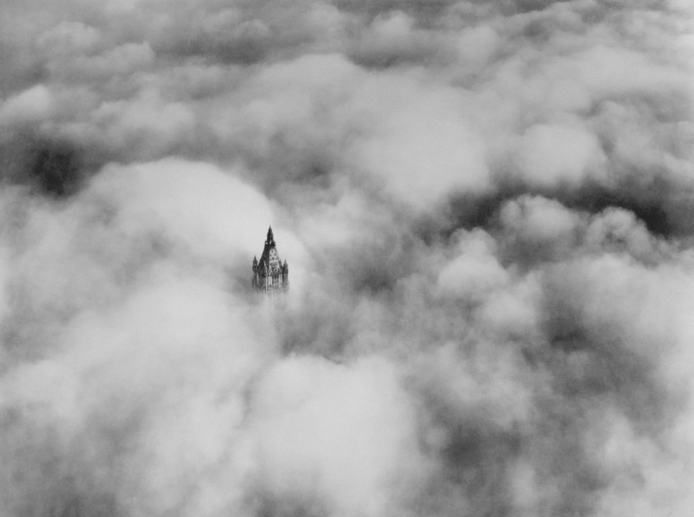 Woolworth tower in clouds, New York City Summary Woolworth Building.