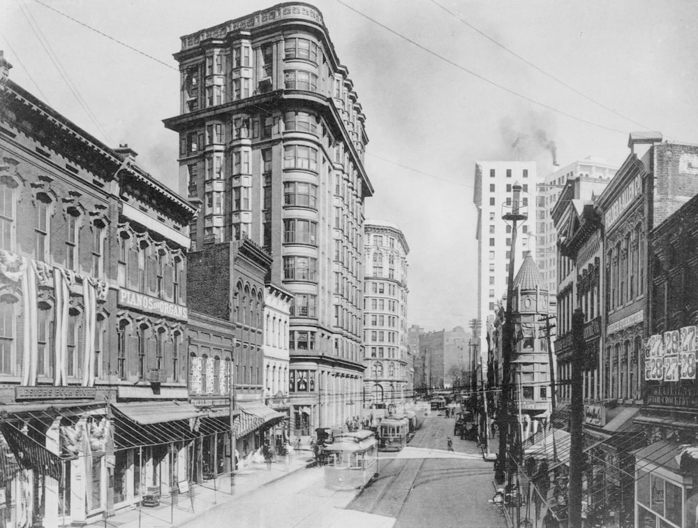 Lower Peachtree Street Summary Print shows view of lower Peachtree Street with Lester's Book Store, the Flatiron Building, Piedmont Hotel, and the Candler Building visible, also shows trolley cars