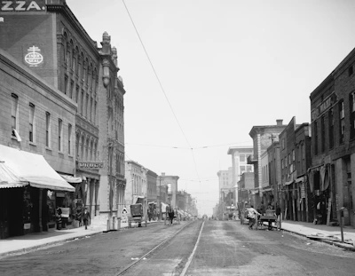 Historic archive photo displaying Millbrook’s early industrial buildings alongside today’s vibrant streets.