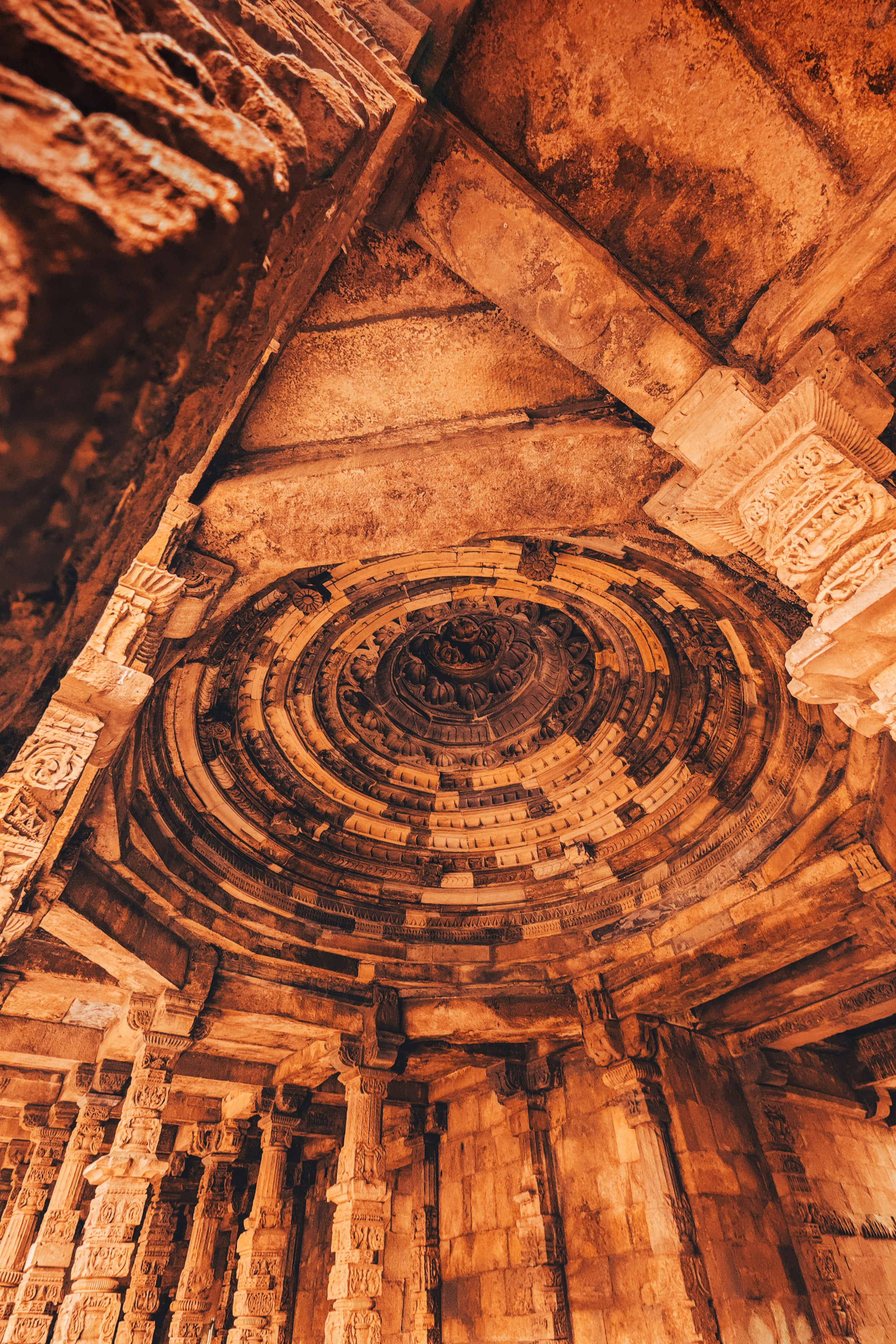 the ceiling of a building with a circular design