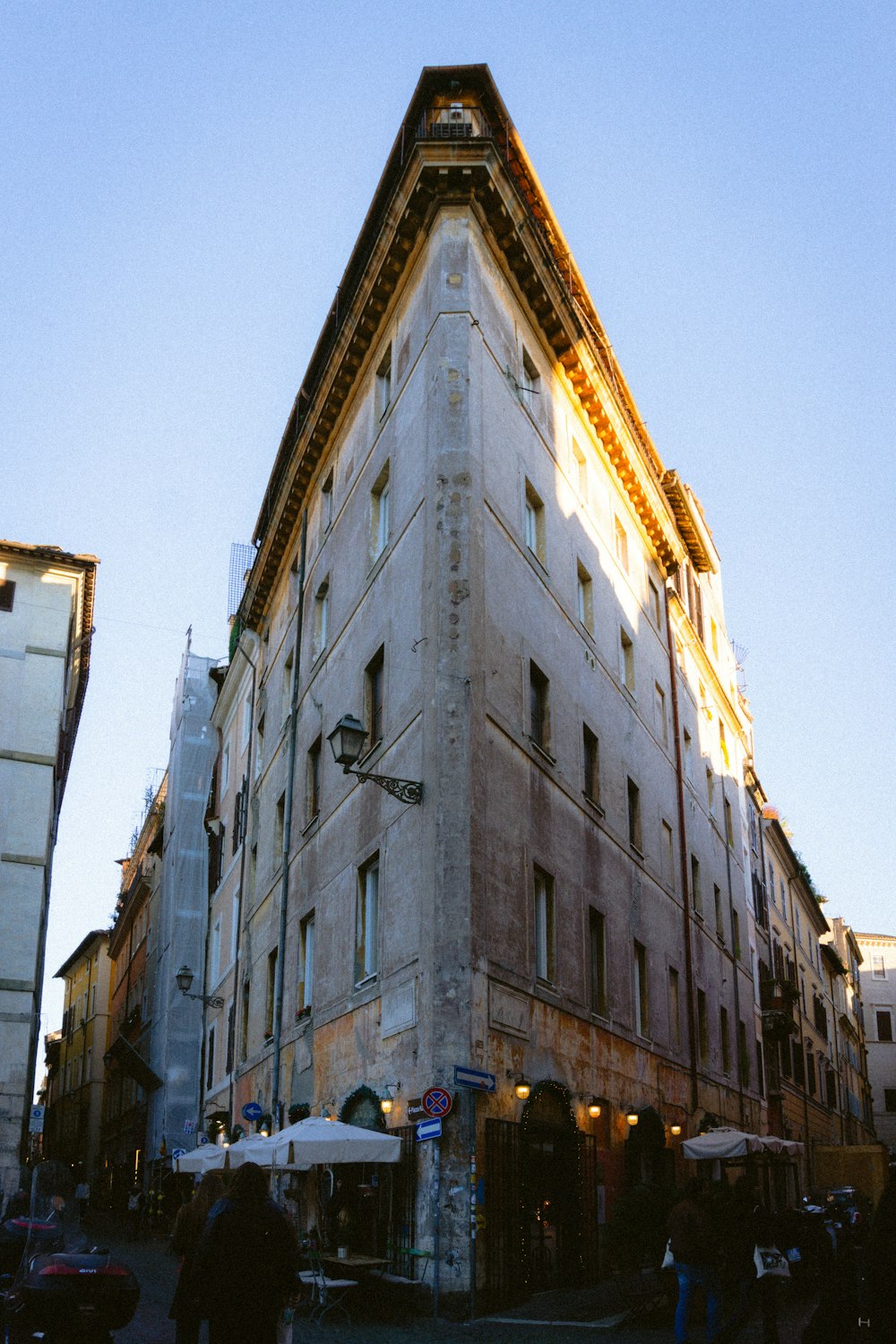 a tall building with a clock on the top of it