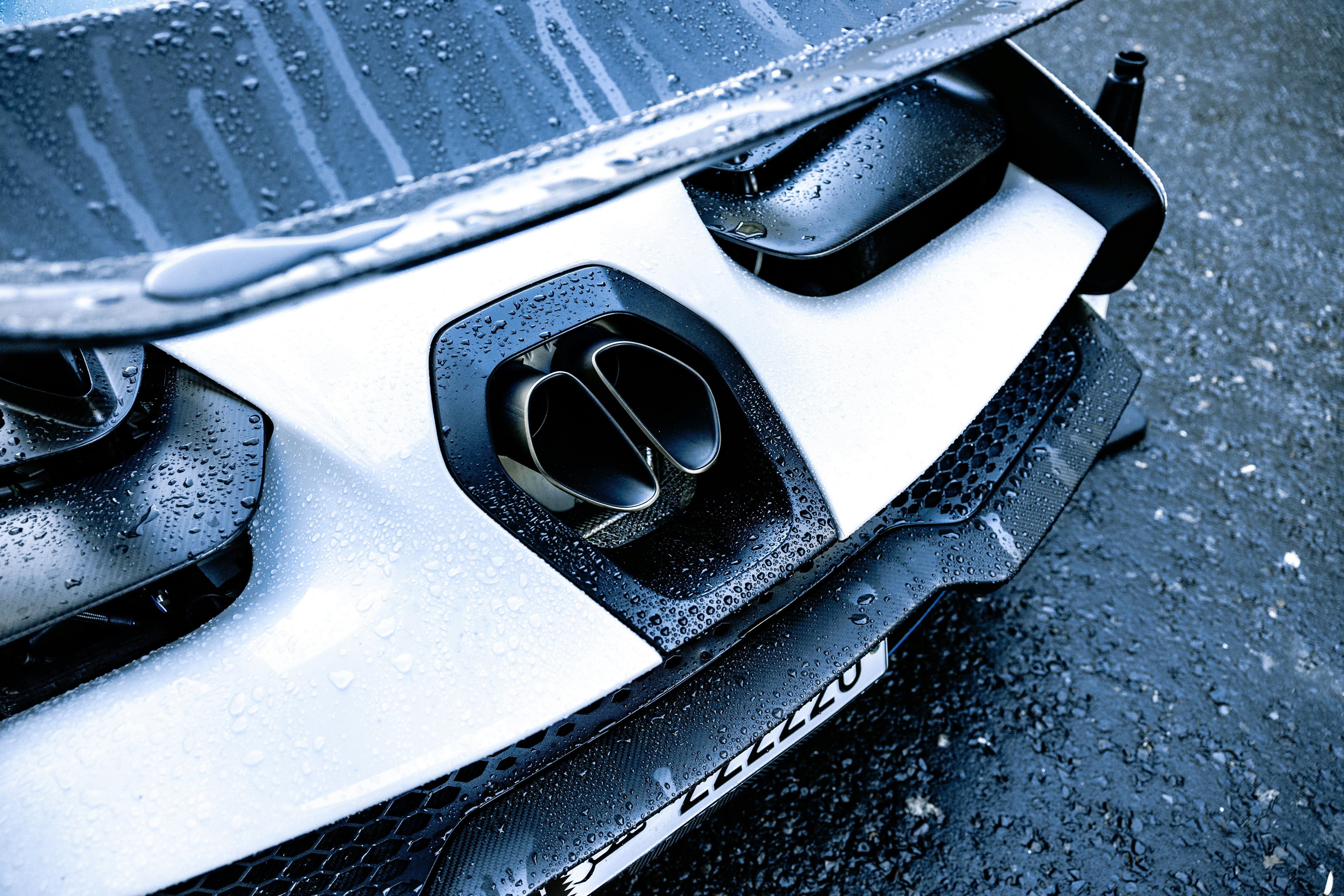 Mechanic replacing brake pads on a modern car brake caliper