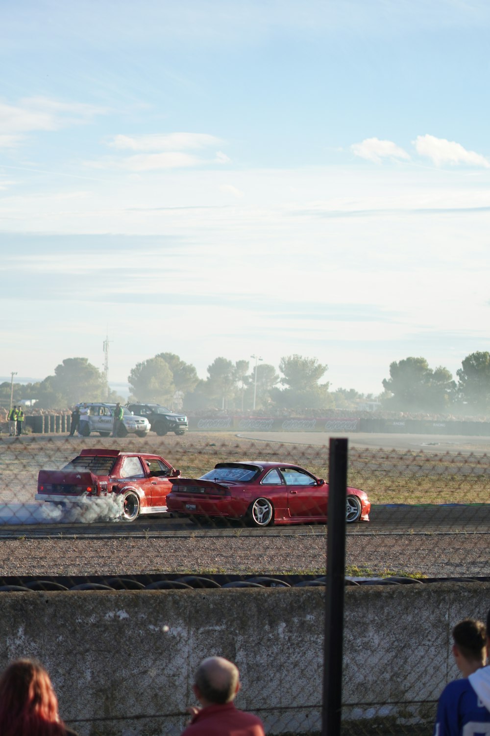 a couple of cars that are on a track