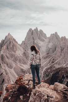 a person standing on top of a mountain
