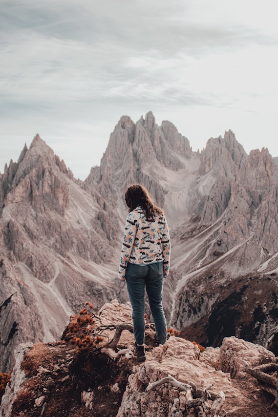 a person standing on top of a mountain